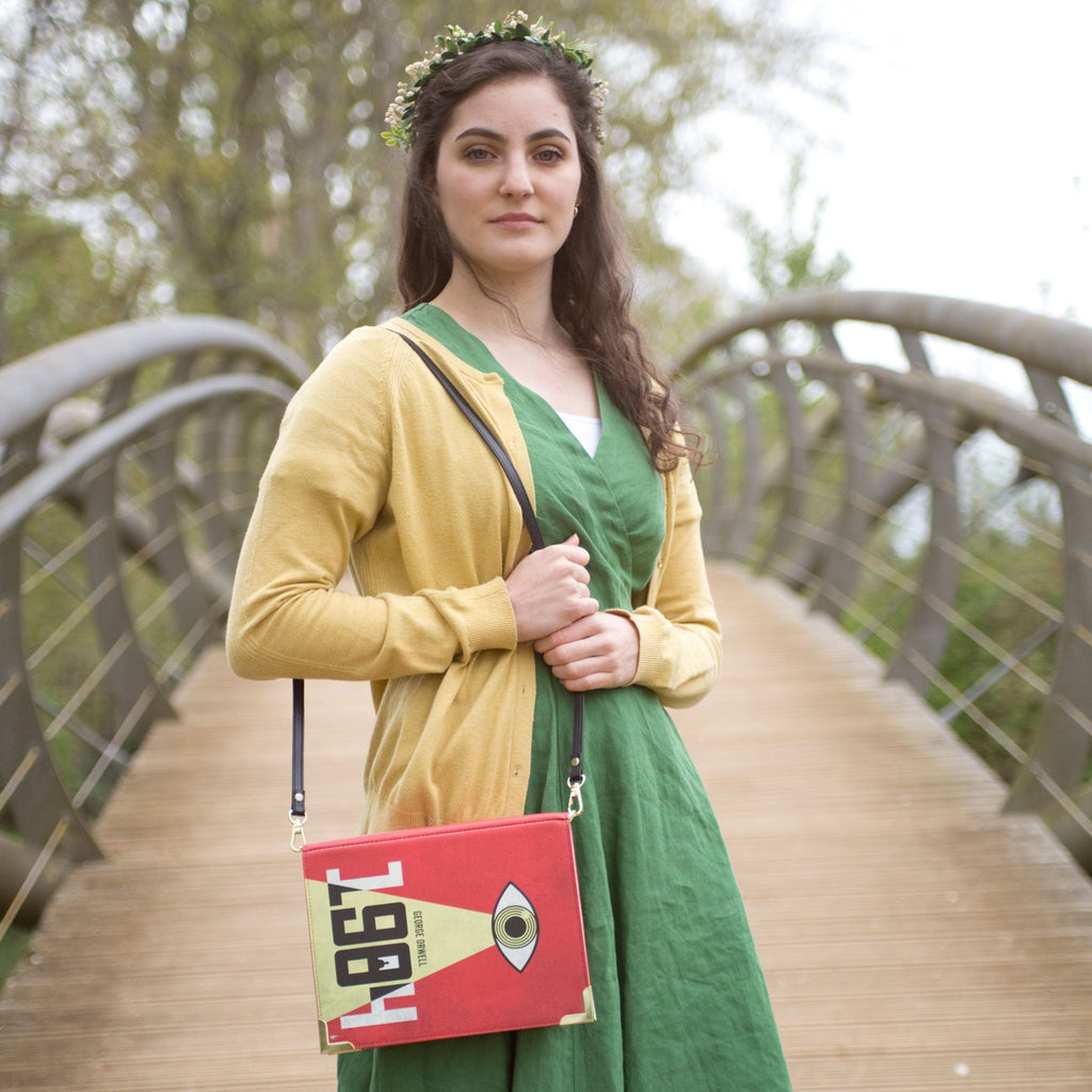 1984 Red and Yellow Handbag by George Orwell featuring Big Brother Eye design, by Well Read Co. - Model in Green