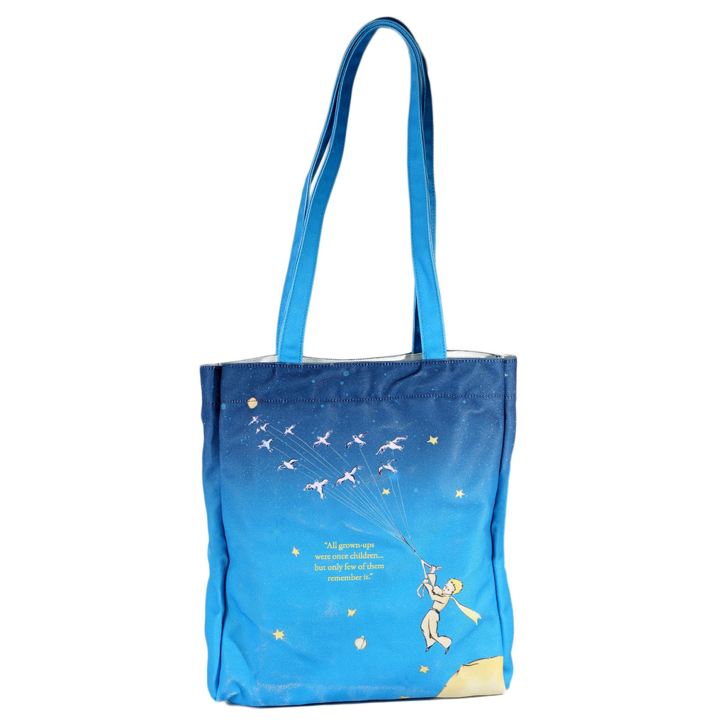 The Little Prince Blue Tote Bag by Antoine de Saint-Exupéry featuring Little Prince on his Home Planet design, by Well Read Co. - Back