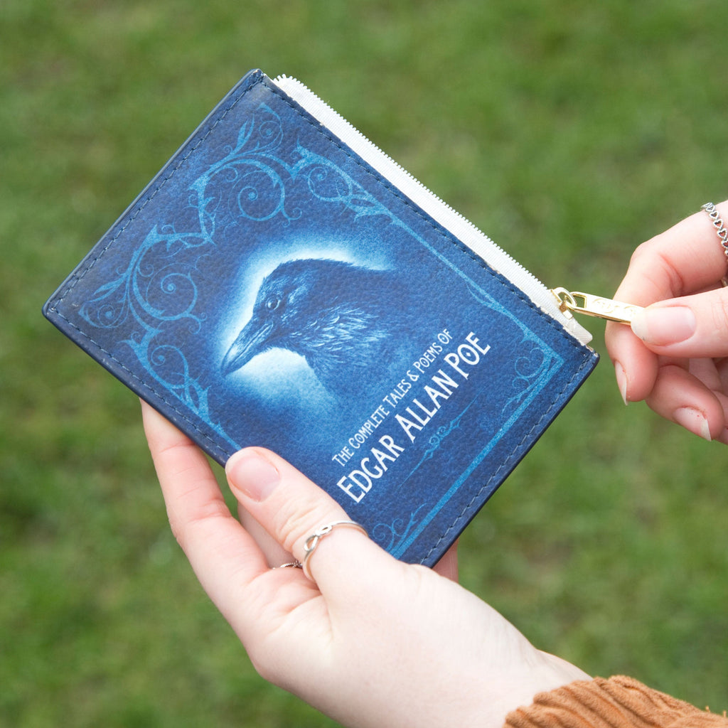 Complete Tales and Poems Raven Blue Coin Purse by Edgar Allen Poe, by Well Read Co. - Hands