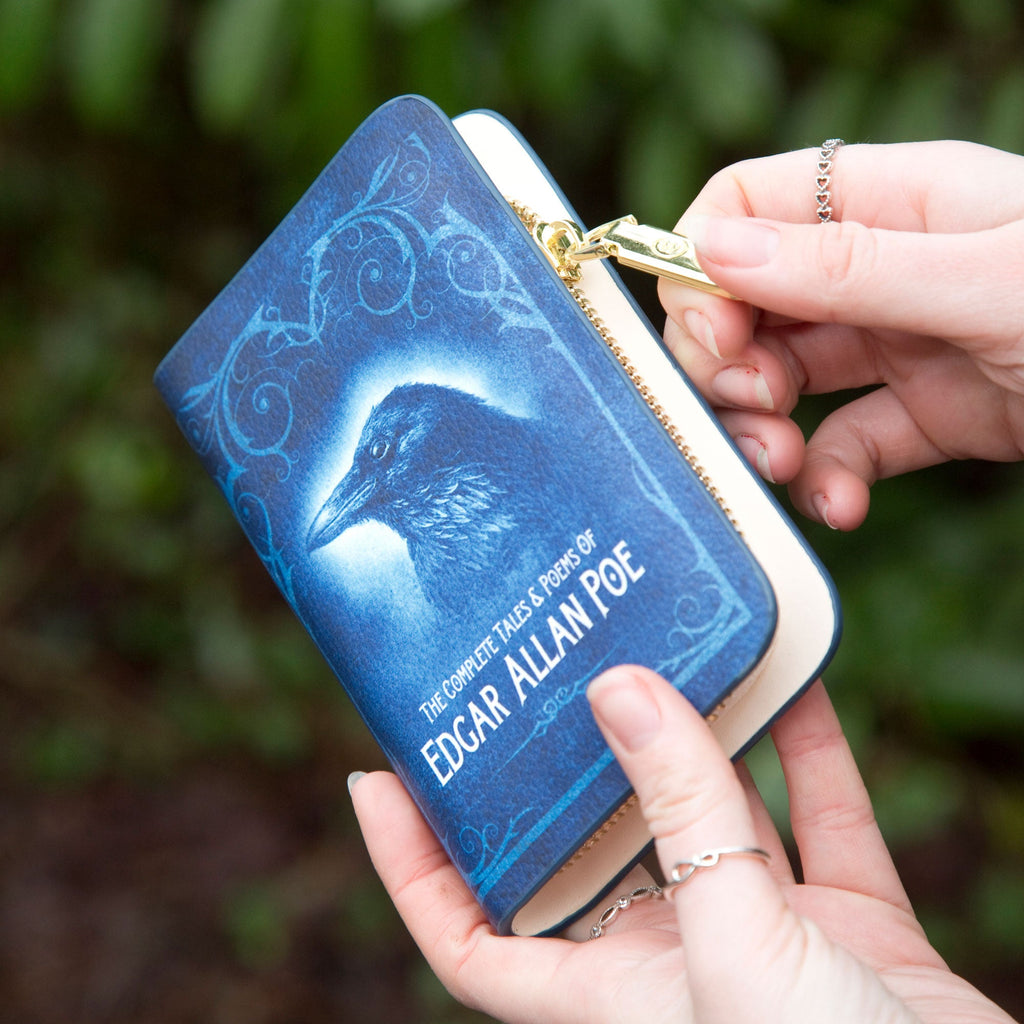 Complete Tales and Poems Blue Wallet Purse by Allan Edgar Poe featuring Raven design, by Well Read Co. - Hands