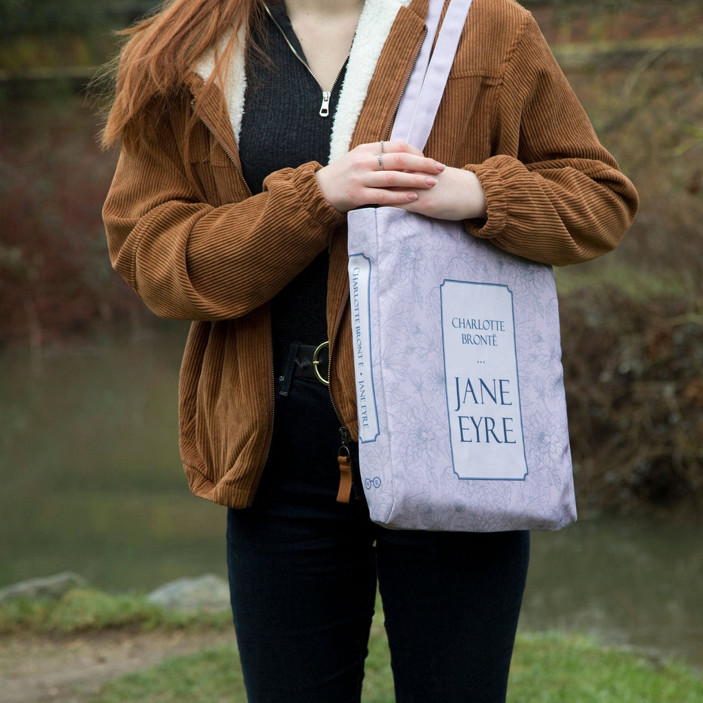 Jane Eyre Lilac Tote Bag by Charlotte Brontë featuring Floral design, by Well Read Co. - Model