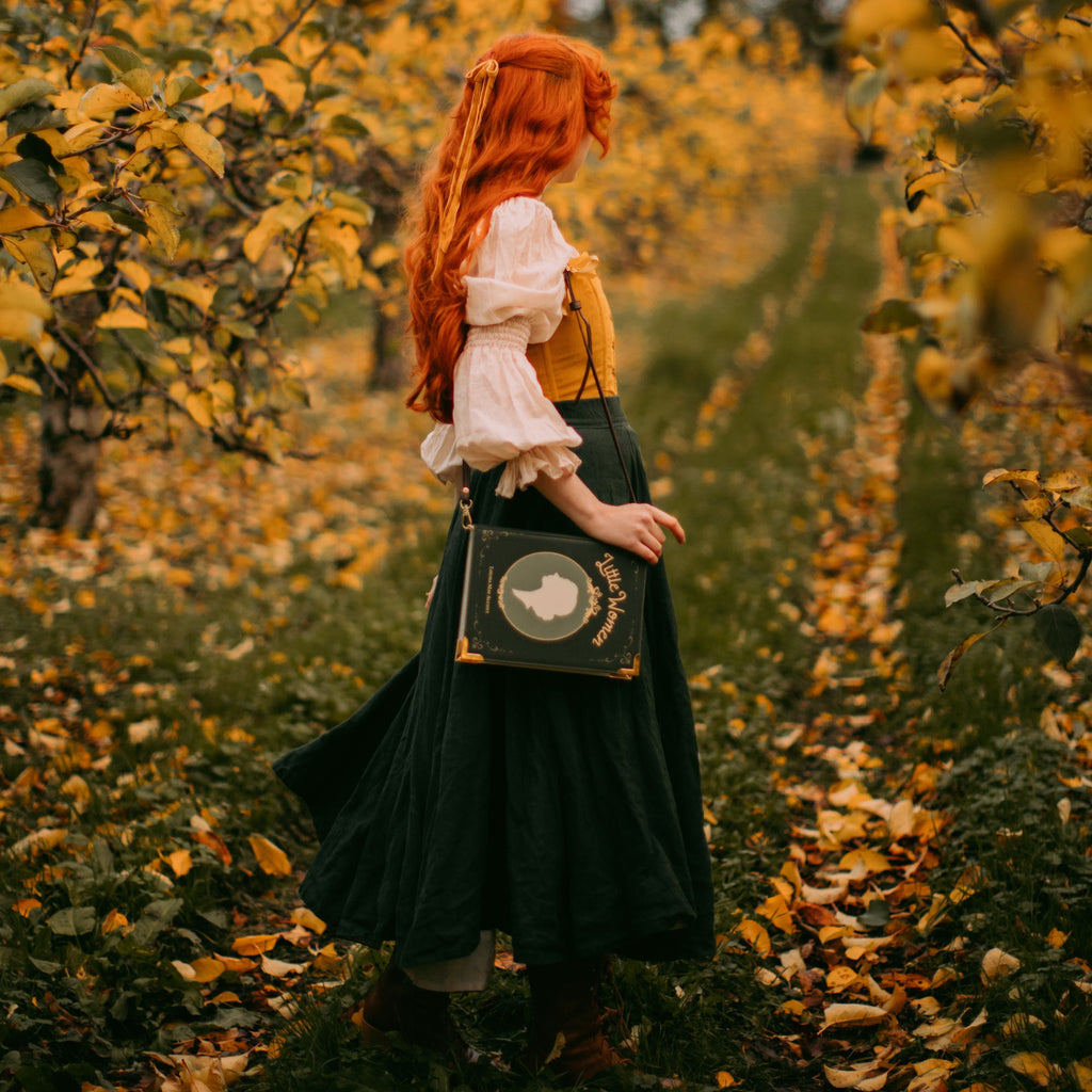 Little Women Green Handbag by Louisa May Alcott featuring Young Woman Profile design, by Well Read Co. - Model Standing with Bag